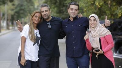 Mohammed Fahmy (second left) and his wife Marwa Omara (far left) and Baher Mohamed (second right) and his wife Jehan Rashed (far right)