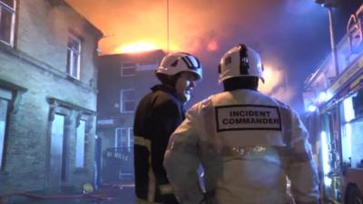 Fire fighters at the Bradford mill fire