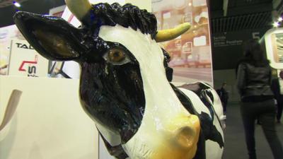 A fibreglass cow at Mobile World Congress 2016