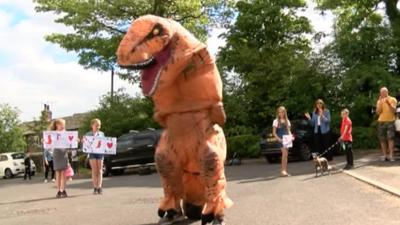 Doctor dressed as Dorothy the dinosaur