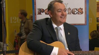 Michael Dugher and guitar