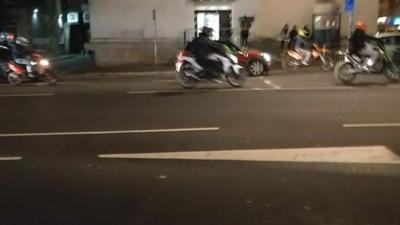 Bikers riding along a road in Leeds