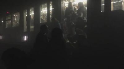 Passengers evacuating train in Belgian metro tunnel