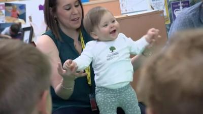 Babies are being taken into schools to try to improve pupil behaviour and reduce bullying.