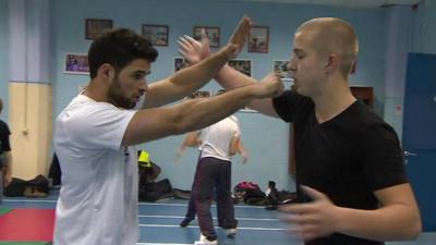 Two men practicing self defence