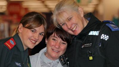 Catherine Maguire (centre), is reunited with paramedic Sarah Ulph (left) and PCSO Debbie Sadler-Knox