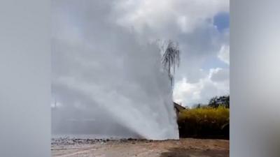 A still from the TikTok video which shows water shooting into the air