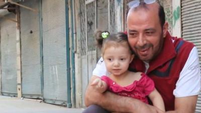 Samia with her grandfather