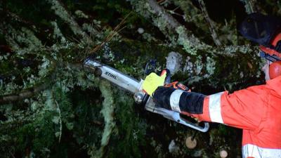 Thousands of homes are spending another day without power after two storms battered parts of Scotland.