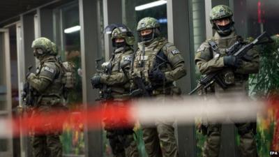 Armed police outside train station