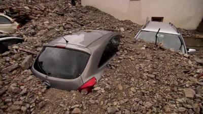 Cars buried after flooding in southwest Germany