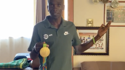 Eliud Kipchoge with his gold medal from Rio 2016