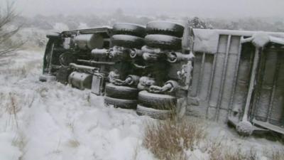 Overturned lorry in the snow