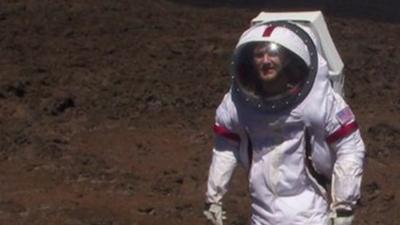 Scientist in spacesuit