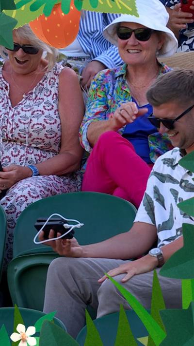 Wimbledon spectator watches England game on his phone