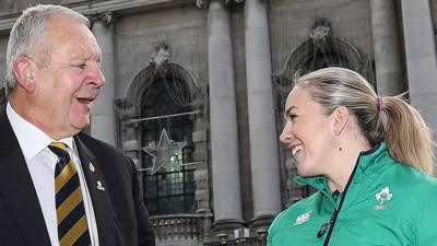 World Rugby's chairman Bill Beaumont with Ireland captain Niamh Briggs after the Women's World Cup draw at Belfast City Hall