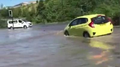 A water main burst leaving Scotswood Road in Newcastle, flooded.