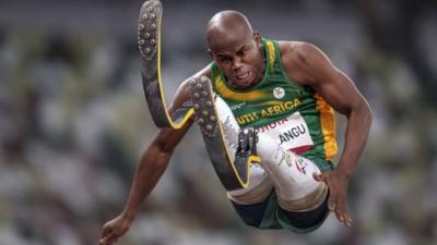 Ntando Mahlangu competing in the long jump.