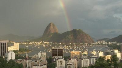 View across to Sugarloaf Mountain in Rio de Janeiro with rainbow