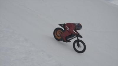 A 56 year old Frenchman has set a new speed record on snow, riding a mountain bike