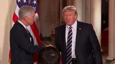 Neil Gorsuch (left) and Donald Trump