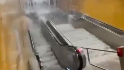 Water cascading down escalator