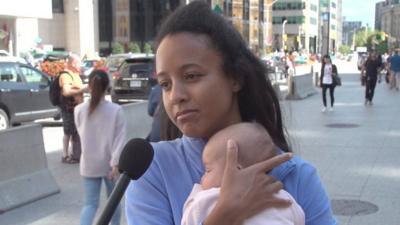 woman holding baby