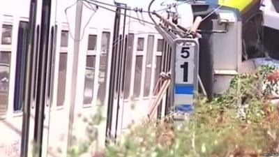 Damaged train carriages