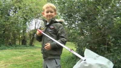 Boy with litter