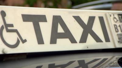 Taxi sign