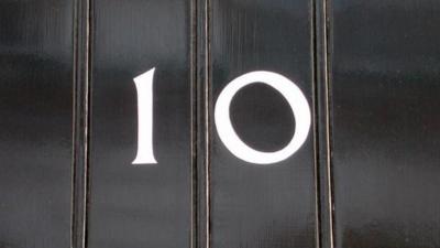 Door sign for Number 10 Downing Street in London