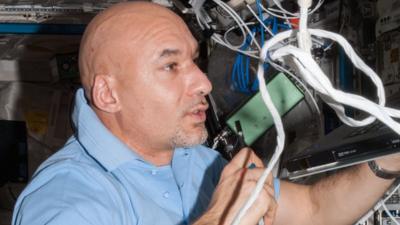 Luca Parmitano working in the Columbus laboratory of the International Space Station