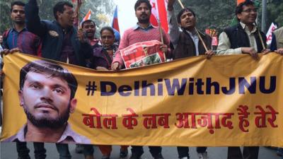 Protesters march in Delhi