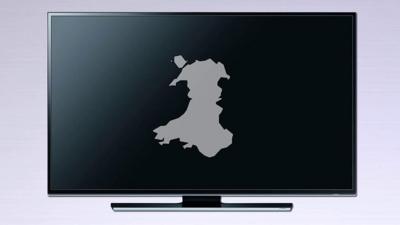 A map of Wales on a TV