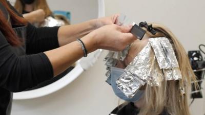 Woman in hair salon