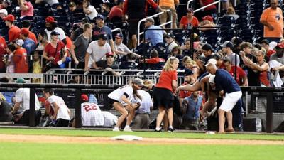 People run for cover after shots heard at Nationals Park