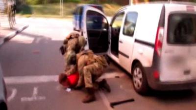 French suspect being tackled