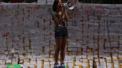 A student protester using a megaphone