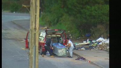 Two men filmed on CCTV dumping waste by a road in Aston, Birmingham