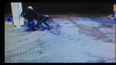 The man lying on the ground on the CCTV footage