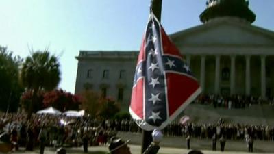 Confederate flag lowered in Charleston