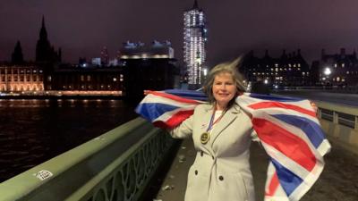 Leave campaigner Mandy Childs celebrates Brexit in Parliament Square