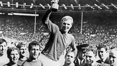 Geoff Hurst (centre) with the World Cup trophy