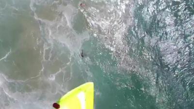 Lifeguards were being trained how to use the drone when the drama unfolded in what's being called a world first rescue.