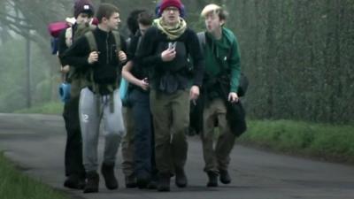 The college students begin their walk