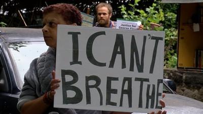 A person protesting in Leeds