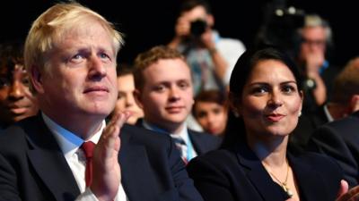 Boris Johnson and Priti Patel