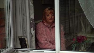 Teresa Cryer sitting indoors