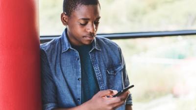 Boy using phone