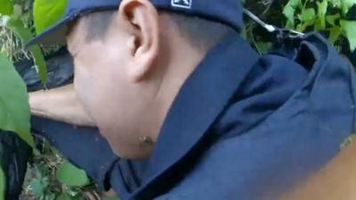 Police officer with a bee sitting on his neck